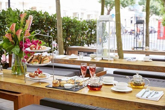 Breakfast, brunch of high tea at Cafe Forty One With platters of sandwiches and champagne flutes