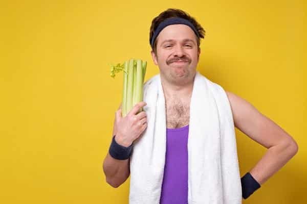 man holding veg