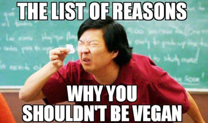 Meme of Ken Jeon from Community squinting at a small piece of paper with the tag 'The list of reasons why you shouldn't be vegan'