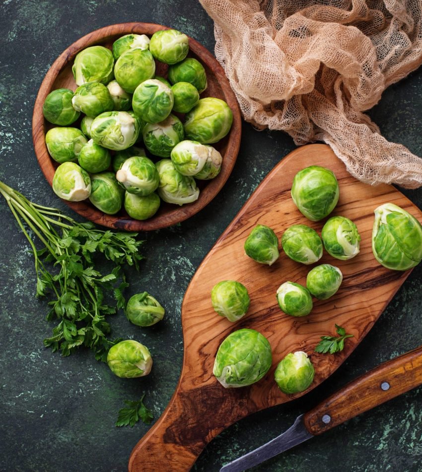 brussels sprouts on green concrete background 2022 02 08 22 39 26 utc