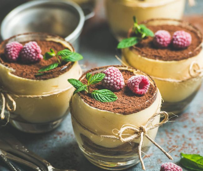 homemade tiramisu in glasses with mint leaves and 2021 08 26 16 17 48 utc